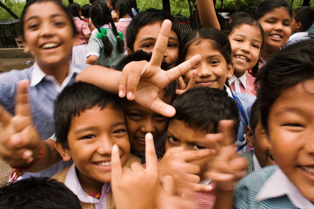 elementary students posing for a camera for school fundraising ideas