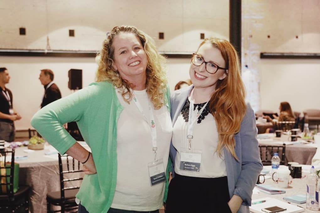 Two women attendees of the Lakeland Fundraising Lab smiling for the camera