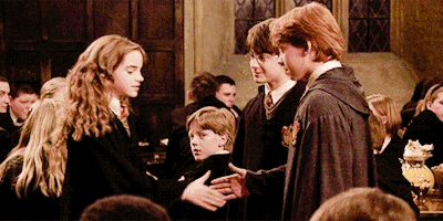 ron weasley and hermione granger shaking hands