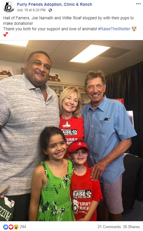 Screenshot of Furry Friends Adoption, Clinic & Research's Facebook post with a photo of staff and kids woth Joe Namath and Willie Roaf