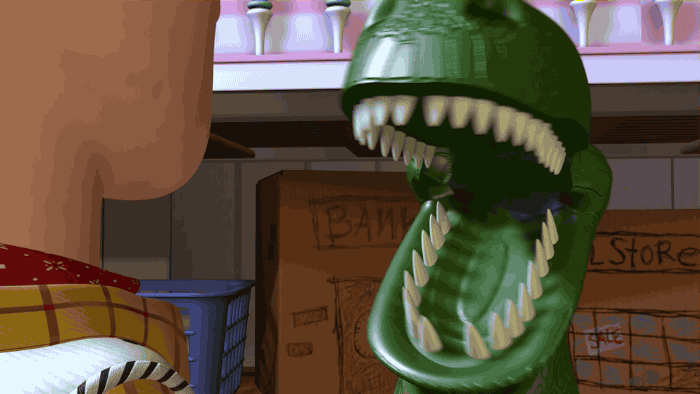 A gif of Rex from Toy Story roaring anxiously