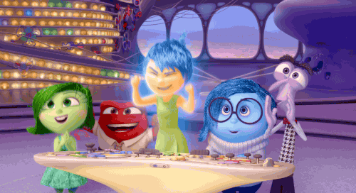 A Gif of Envy, Anger, Joy, Sadness, and Anxiety cheering from a scene in Inside Out