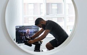 Man working out with workout tech