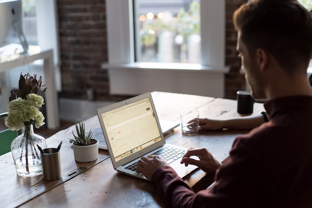 person attending virtual spring fundraising event on a computer