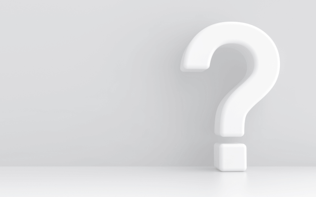 White question mark symbolizing frequently asked questions about nonprofit fundraising platforms