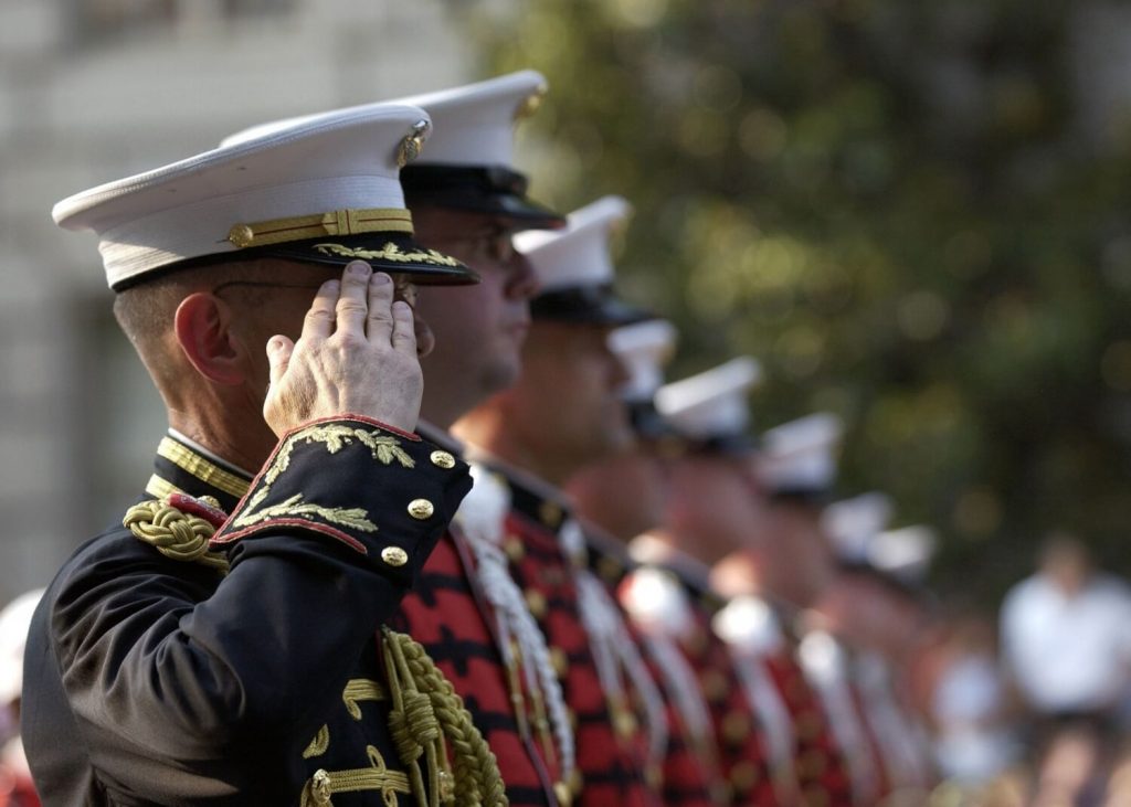 Veteran saluting during a ceremony