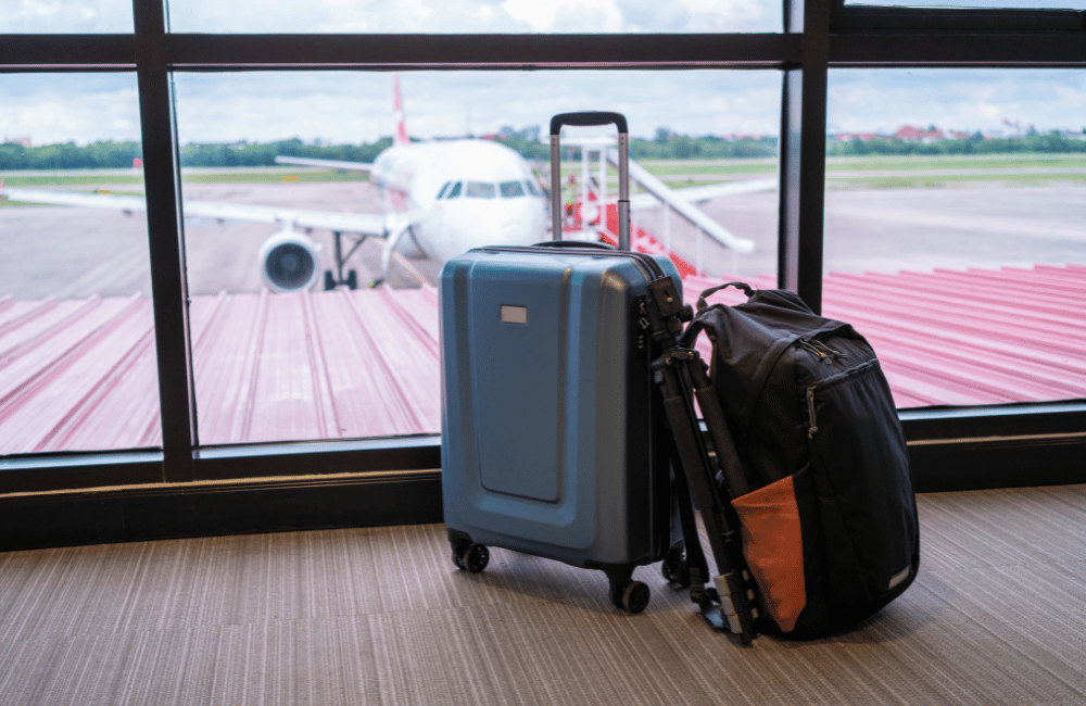 Suitcase and backpack in airport