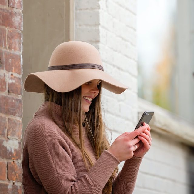 woman texting outside