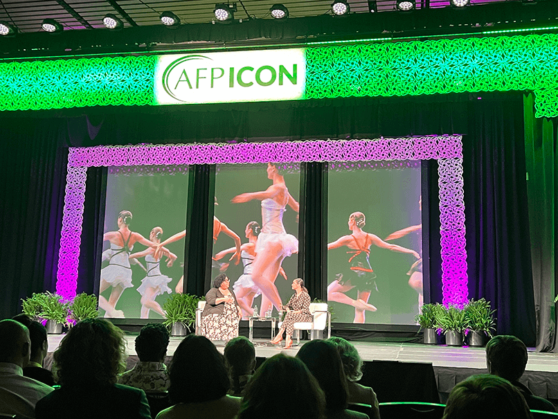 Misty Copeland and Birgit Smith Burton talking on stage at AFP ICON 2023