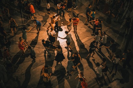 people dancing in a dance marathon fundraiser for a BBBS peer-to-peer campaign event