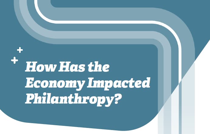 Graphic with words, "How has the economy impacted philanthropy?" from Qgiv's Sustainable Giving Report