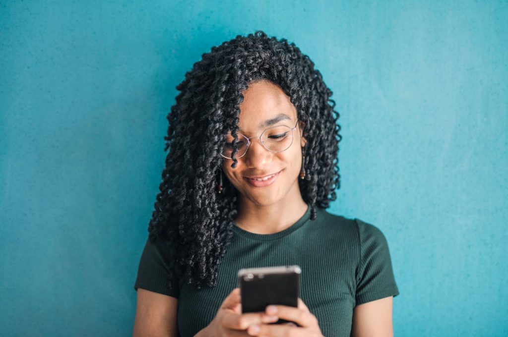 woman responding to tailored text messages for donors segments