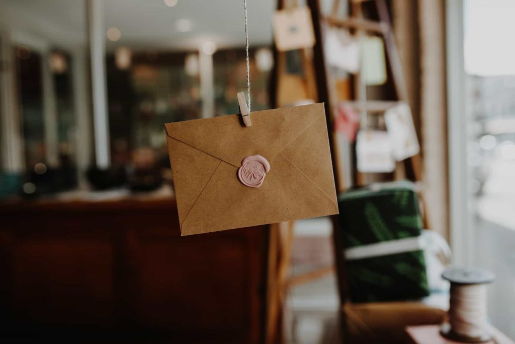 donation letter in envelope on string