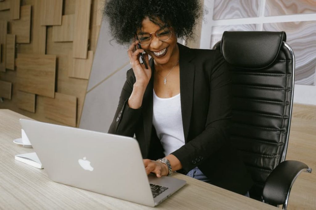 woman making calls to donors from desk