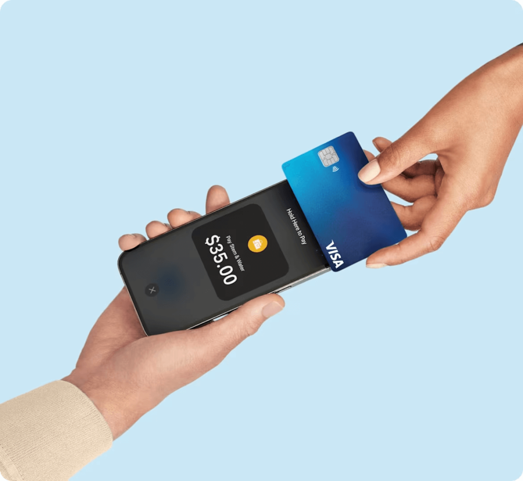 Someone using Square’s tap-to-pay feature